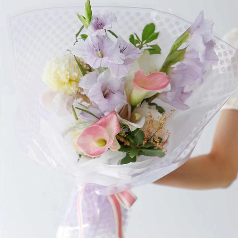 Genomskinlig plastblommafilm